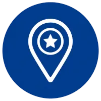 Blue circular background featuring a white map pin icon with a star inside, indicating a favorite or highlighted location.